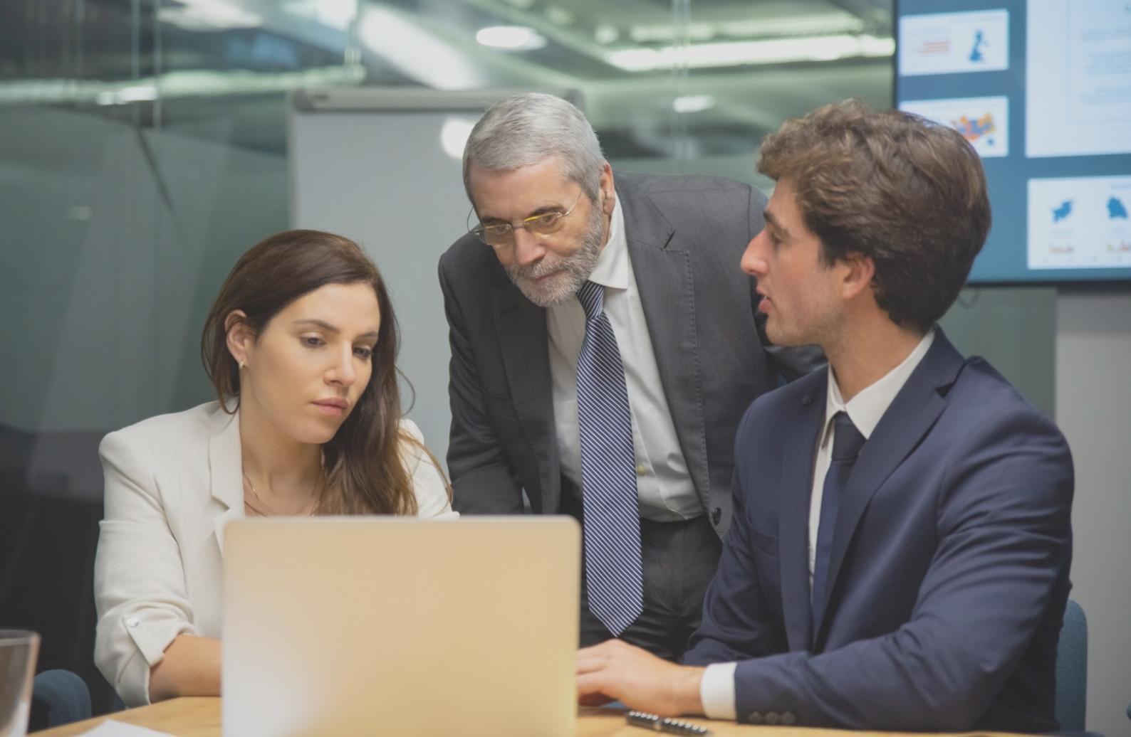 Professional team working on budget analysis and financial planning documents